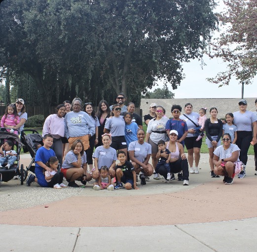 Rooted in Motherhood moms and children gathered outdoors in Stockton